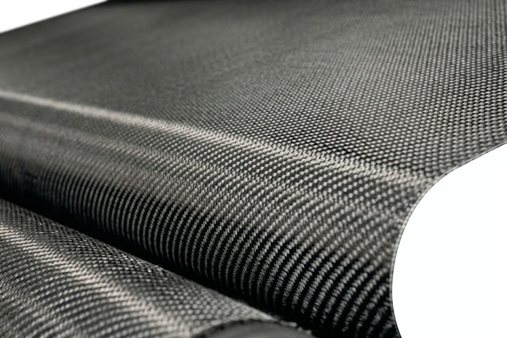 Carbon fiber weave used as the face material on composite pickleball paddles